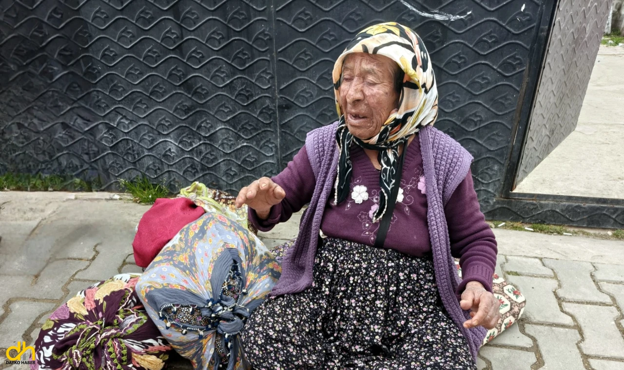 Evinde yangın çıkan kadını komşuları kurtardı