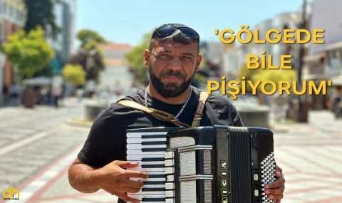 Sokak müzisyeninden ‘Gölgede bile pişiyorum’ şarkısı